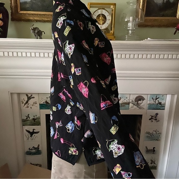Quilted jacket by requirements with purses galore all over on a field of black. - Picture 2 of 5